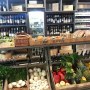 ABASTO BUTCHER, WINE MERCHANT & CAFE, MARYLEBONE, LONDON | Abasto fresh produce displayed on table stand designed by ck-id | Interior Designers